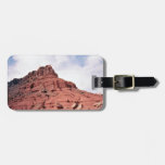 Red mountain against the sky tags for bags