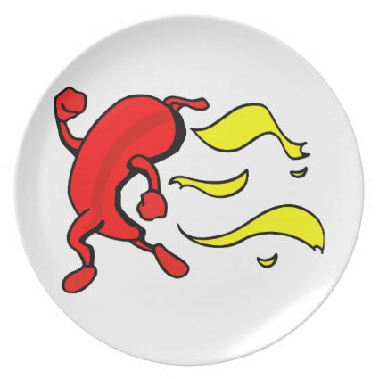 Red pepper running yellow flames behind dinner plate