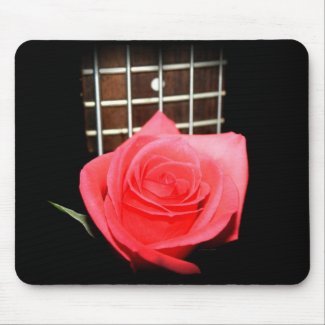 Red pink rose against five string bass fret board mousepad