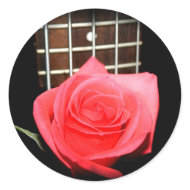 Red pink rose against five string bass fret board sticker