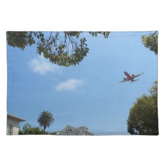 red plane against a blue sky