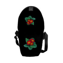 Red Primroses messenger bags