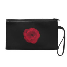 Red Rose. Black Background. Wristlet Purses