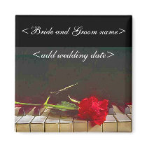 Red Rose Laying On Piano Keyboard magnets
