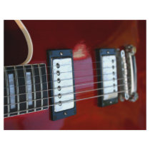 Red semi hollow guitar picture of strings, pickups flyer