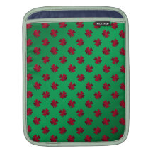 Red shamrocks on green background iPad sleeves