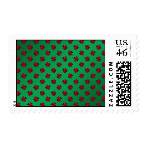Red shamrocks on green background postage stamps