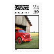 Red truck in barn postage
