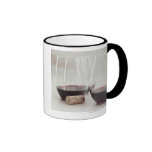 Red wine in stemless glasses mugs