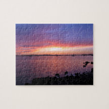 Red, Yellow, and Pink Sunset with Ocean and Clouds Jigsaw Puzzle