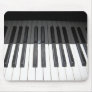 reflection of black and white piano keys mouse mat