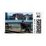 Relaxing by the Manhattan Skyline Postage