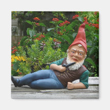 Relaxing Gnome with Santa Cap Fridge Magnet