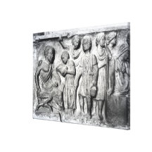 Relief depicting a boy reading to his teacher stretched canvas prints