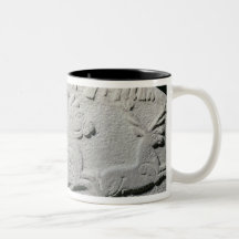 Relief depicting a deer hunt mug