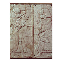 Relief depicting a guard holding postcard