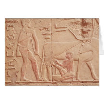Relief depicting a man milking a cow cards