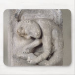 Relief depicting a man mouse pads
