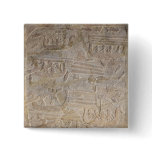 Relief depicting the unloading of wood buttons