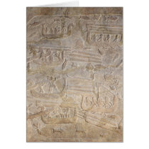 Relief depicting the unloading of wood card