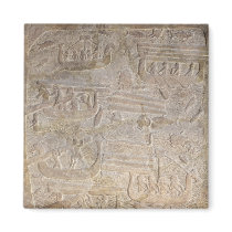 Relief depicting the unloading of wood refrigerator magnet