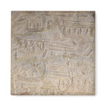 Relief depicting the unloading of wood refrigerator magnet