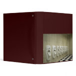 restroom interior with urinal row vinyl binders