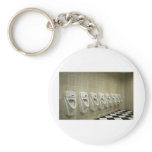 restroom interior with urinal row keychain