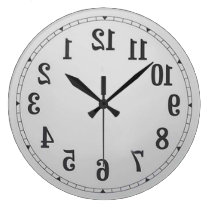 Reverse Numbers Wall Clock at Zazzle