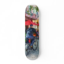 Riding Past the Cafe skateboards
