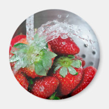 Rinsing Strawberry With Water Fridge Magnets