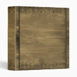 rivetted grungy gold metal plate 3 ring binder