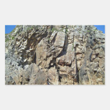 Rock formation against a clear blue sky sticker