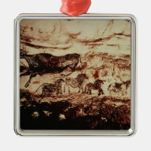 Rock painting of a leaping cow christmas ornament