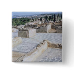 Roman ruins of the port of Emporion Button