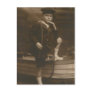 Romantic sailor leaning on boat postcard