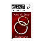 Romantic Wedding Rings on Red Postage Stamps