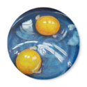ROUND MAGNET WITH ARTWORK OF TWO EGGS