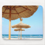 Row-of-beach-umbrellas BEACH GRASS UMBRELLAS OCEAN Mousepads