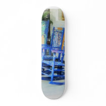 Row of Blue Rocking Chairs skateboards