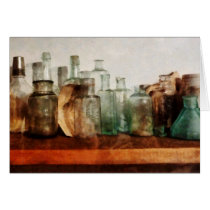 Row of Medicine Bottles Greeting Cards