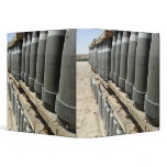 Rows of ammunition are stacked and prepped binders