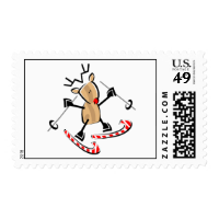 rudolph skiing on camdy canes stamp