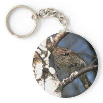 Ruffed grouse perched in a birch tree key chains