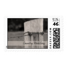 postcard - Pair these unique Rural Fence Post Country Wedding Postage Stamps with the matching country wedding invitations, announcements and cards to create a coordinated wedding set. Image is a black and white farm photograph of a wooden fence post and barbed wire.