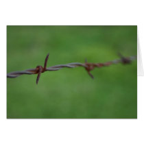 Rusty barb wire fence greeting card