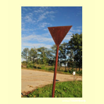 Rusty street sign and blue skies t-shirts
