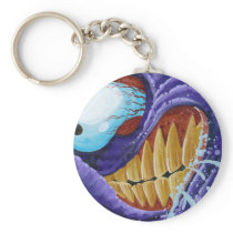 "S#!T-EATING GRIN" KEYCHAIN