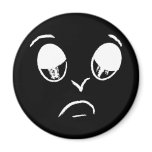 Sad face fridge magnet