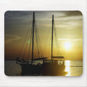 sailboat at sunset mousepads